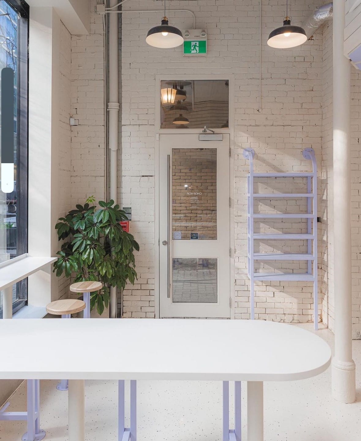 Chop Hop seating ledge and slat wall cladding near the entrance