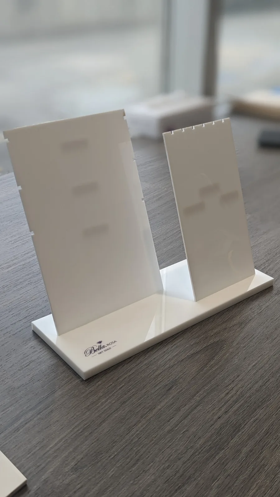 Two-panel white acrylic jewellery stand prototype made by DNS