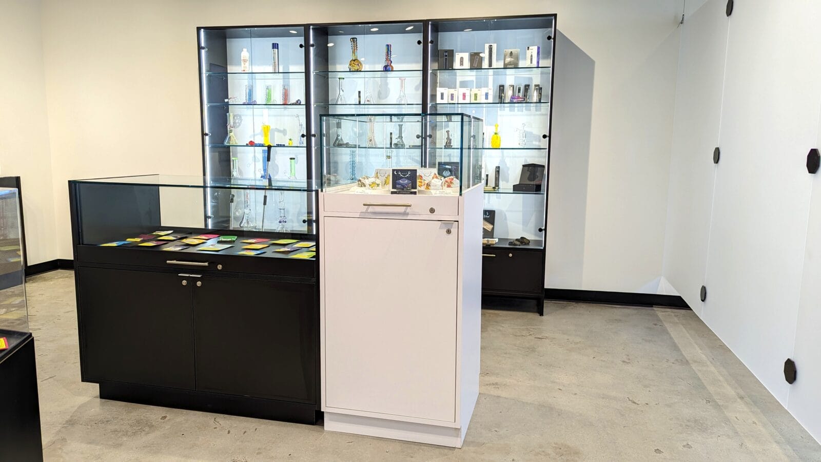 Glass display cases with smoking accessories in shop