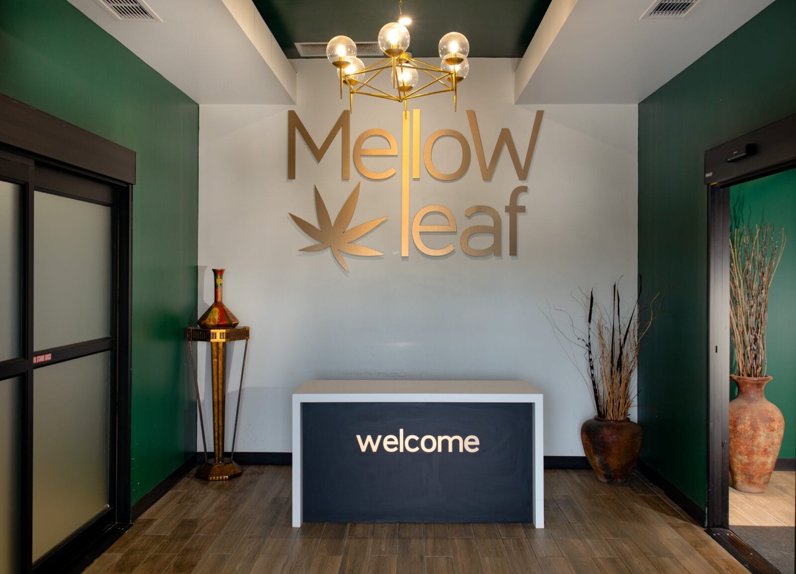 Mellow Leaf lobby with welcome desk and logo