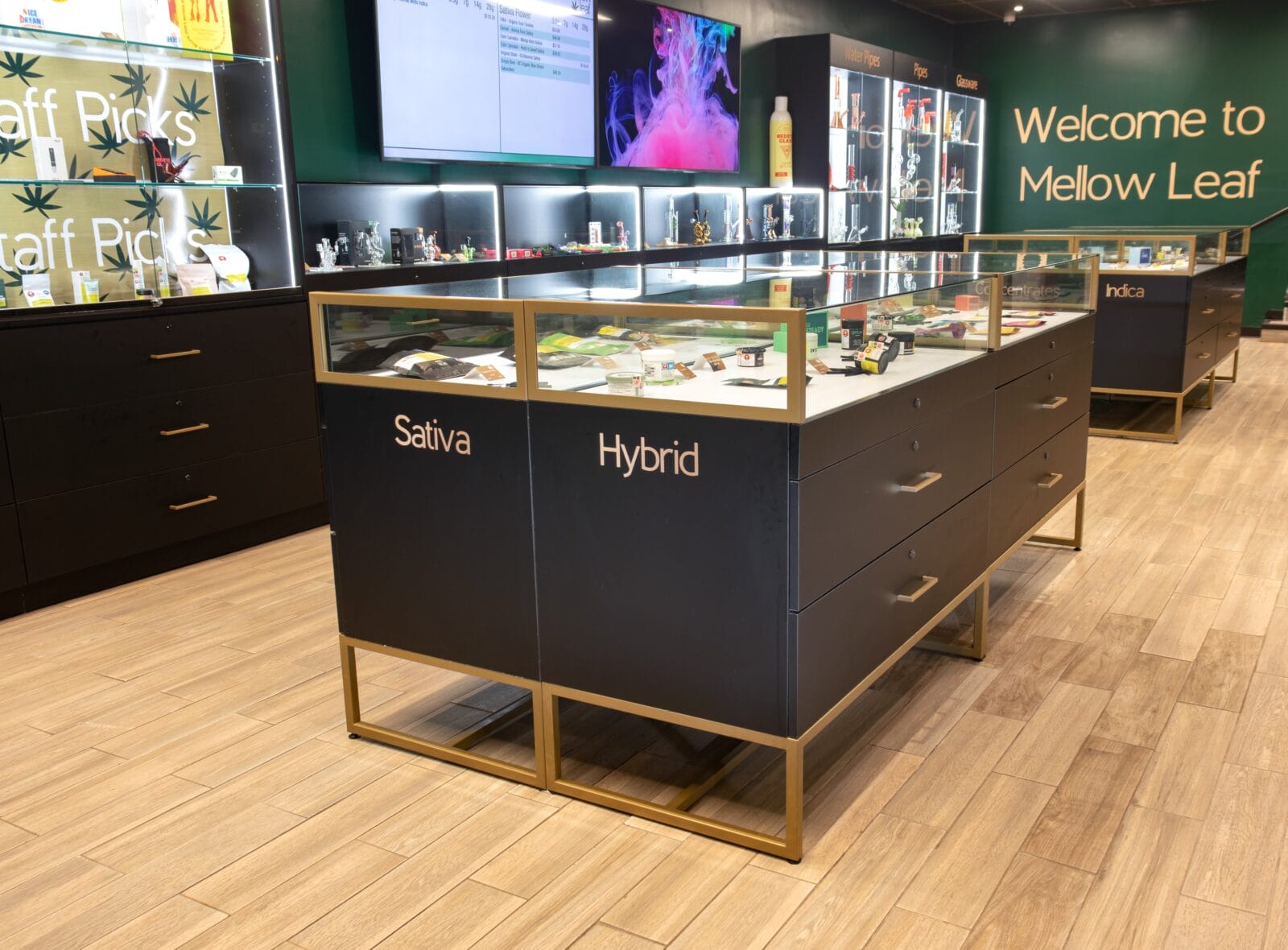 Cannabis dispensary interior with labeled product display cases