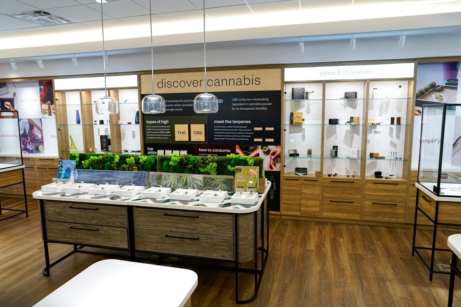 Modern cannabis dispensary interior with product displays