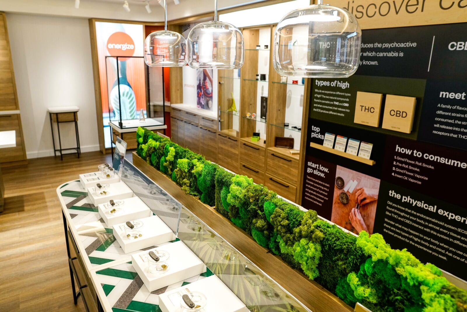 Modern cannabis dispensary interior with product displays