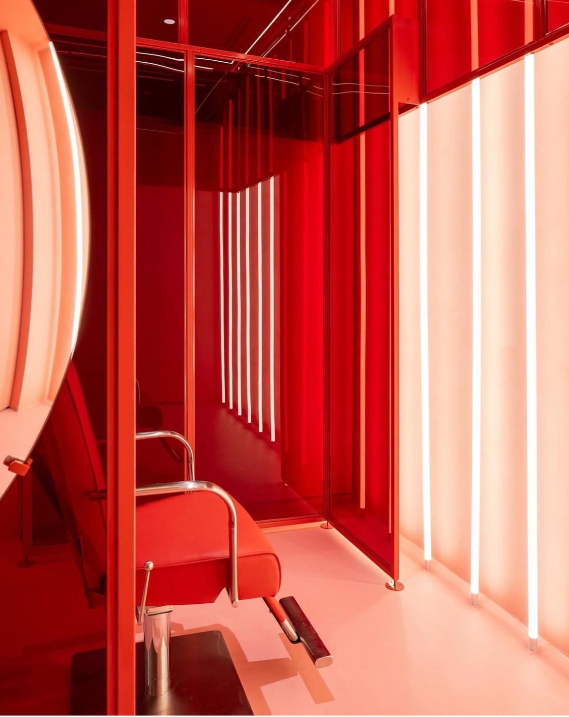 Station at Pout framed by red acrylic and red walls